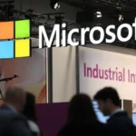 Il CFO di Microsoft segnala i tagli alla forza lavoro mentre la spesa per l’intelligenza artificiale aumenta
